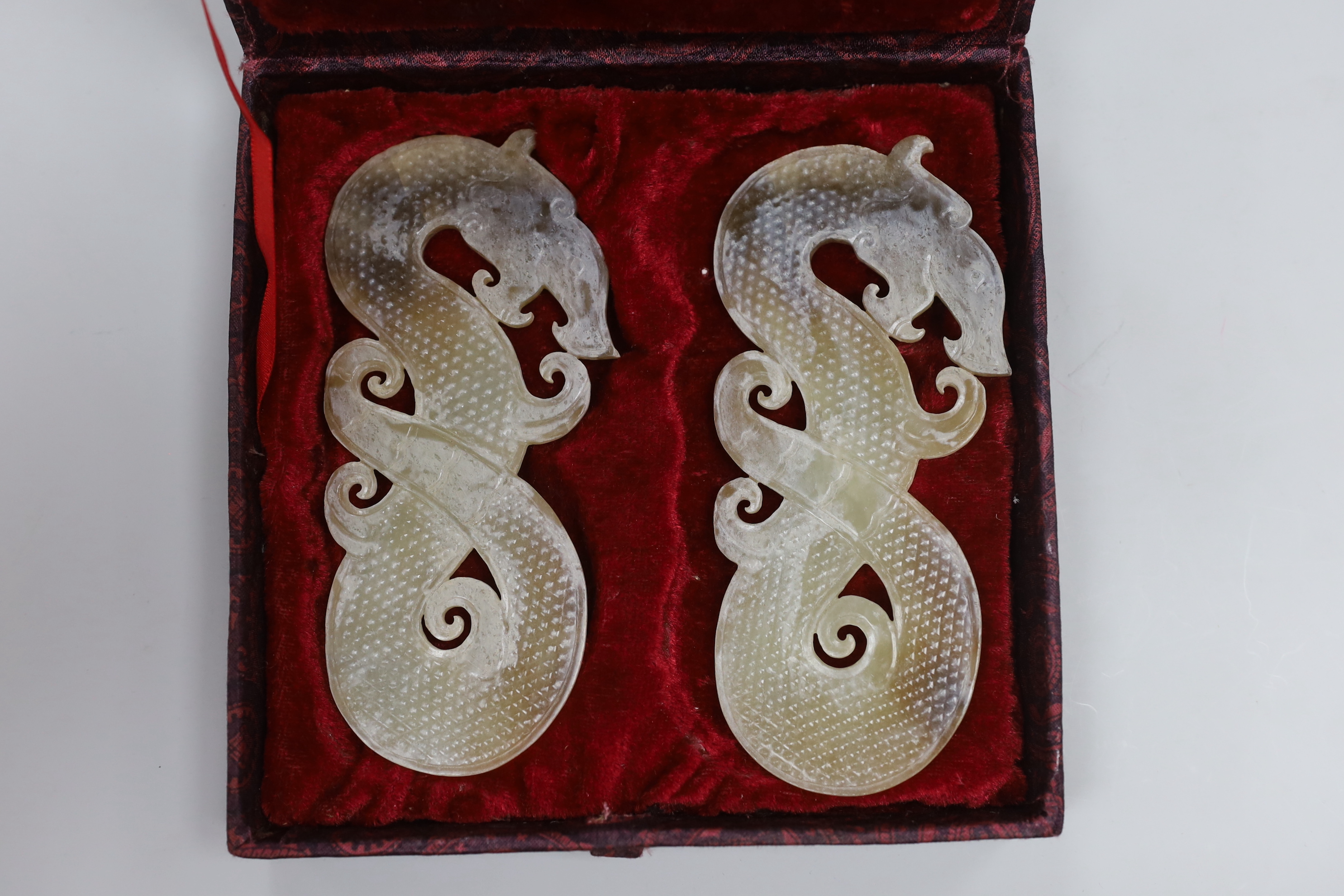 Three cased Chinese archaistic jades